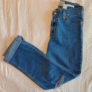 High waisted medium washed ripped mom jeans